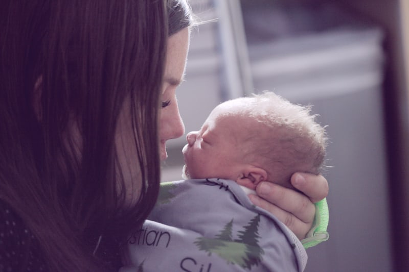 woman holding child